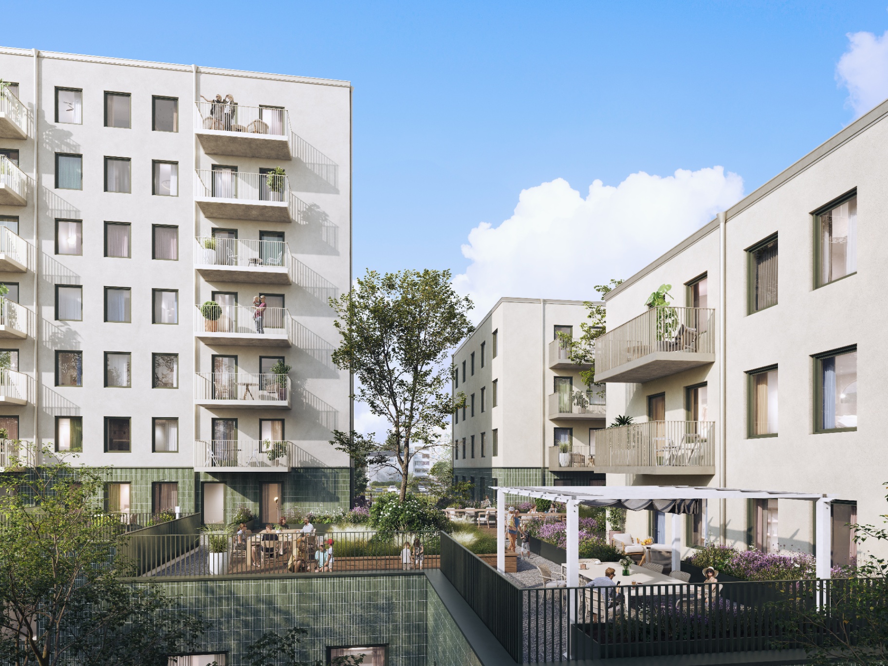 Gårdsmiljö med uteplatser och grönska